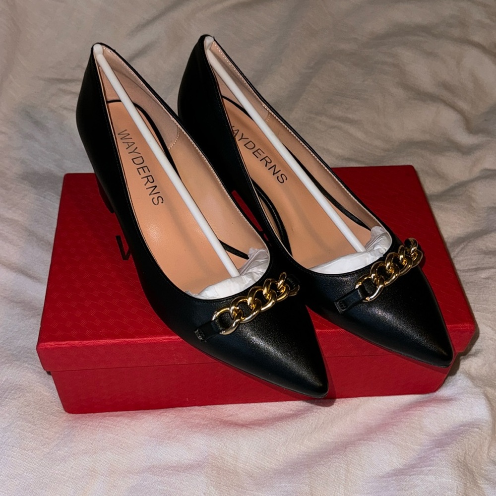 Black heels with gold hardware